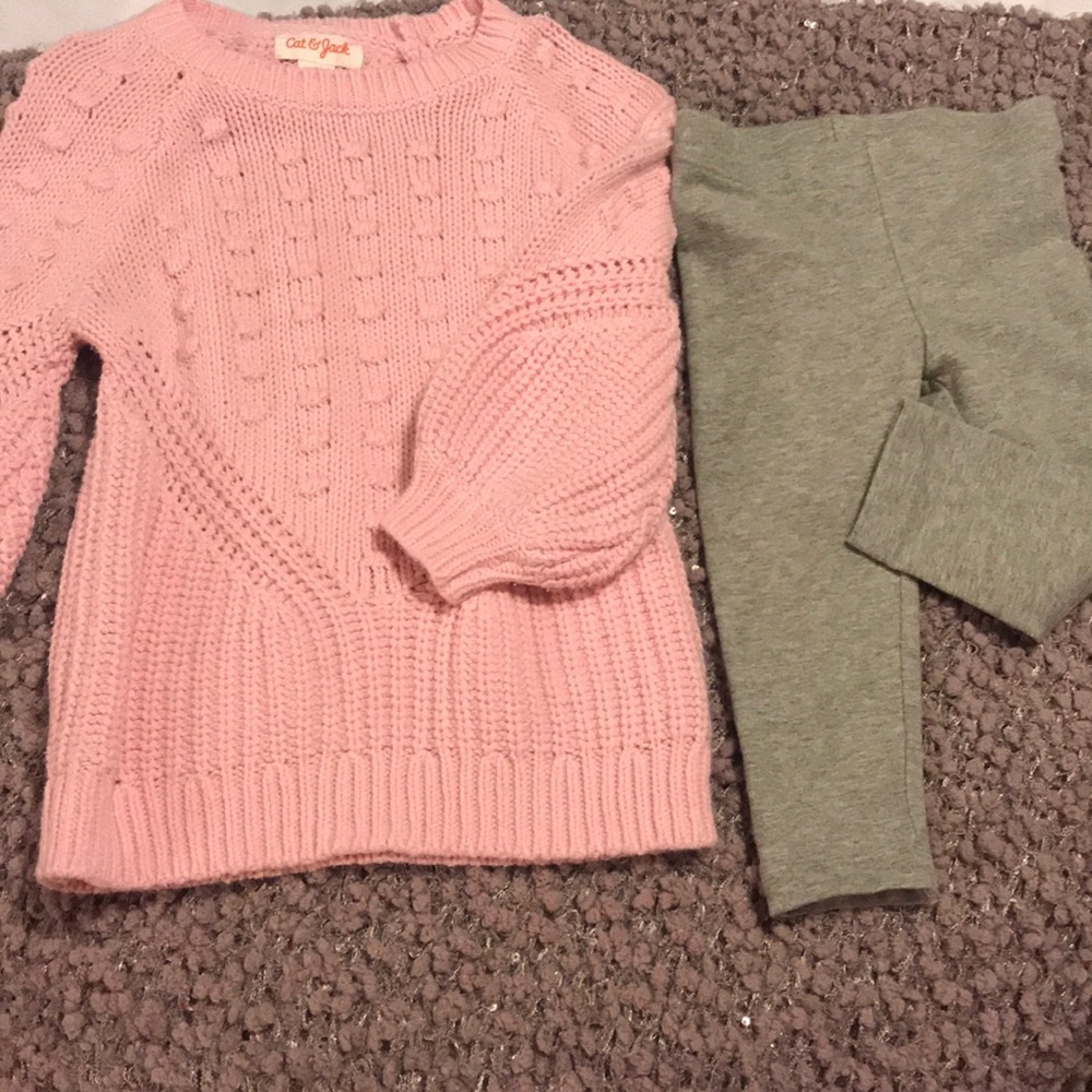 Pink sweater and gray leggings